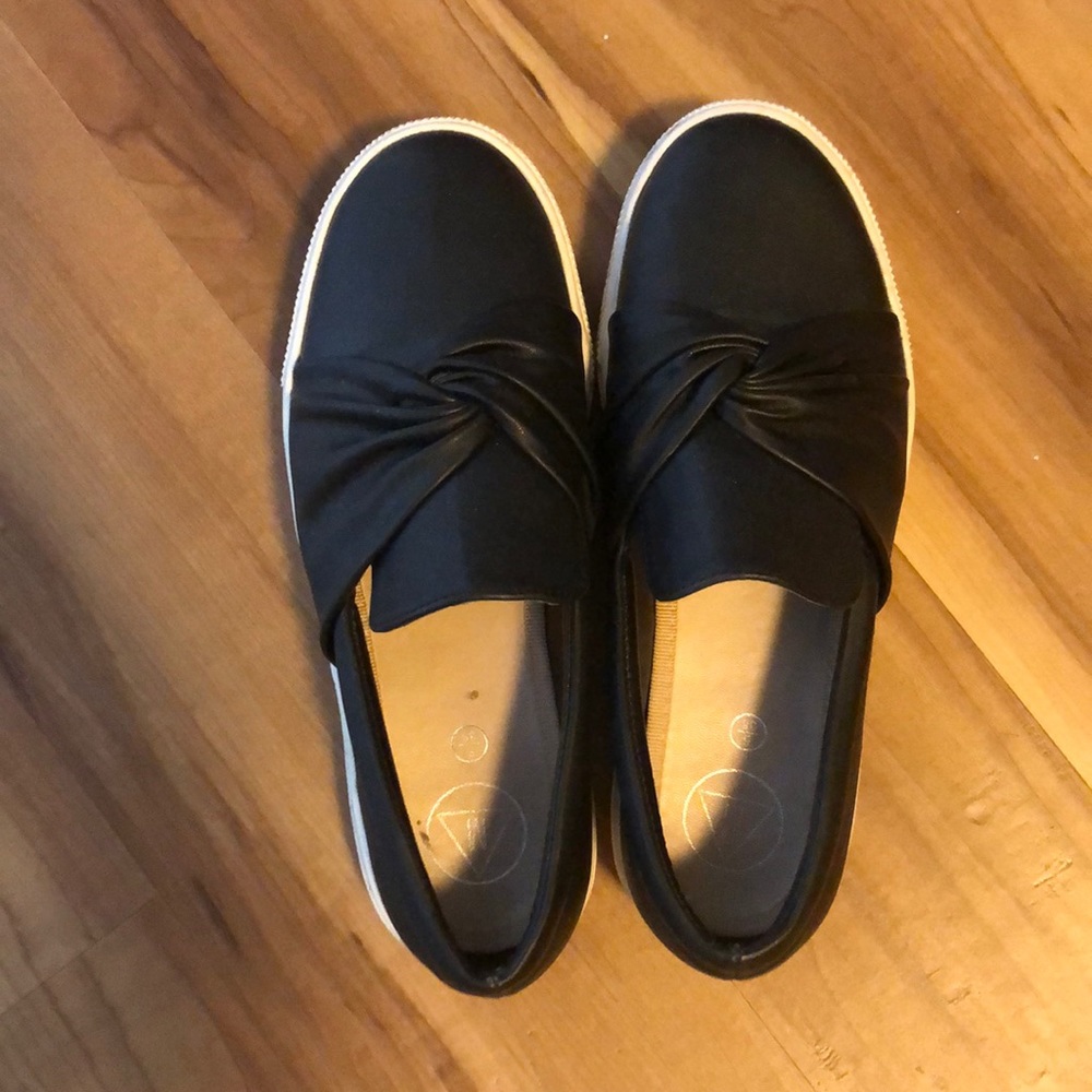 Black faux leather slip on sneakers